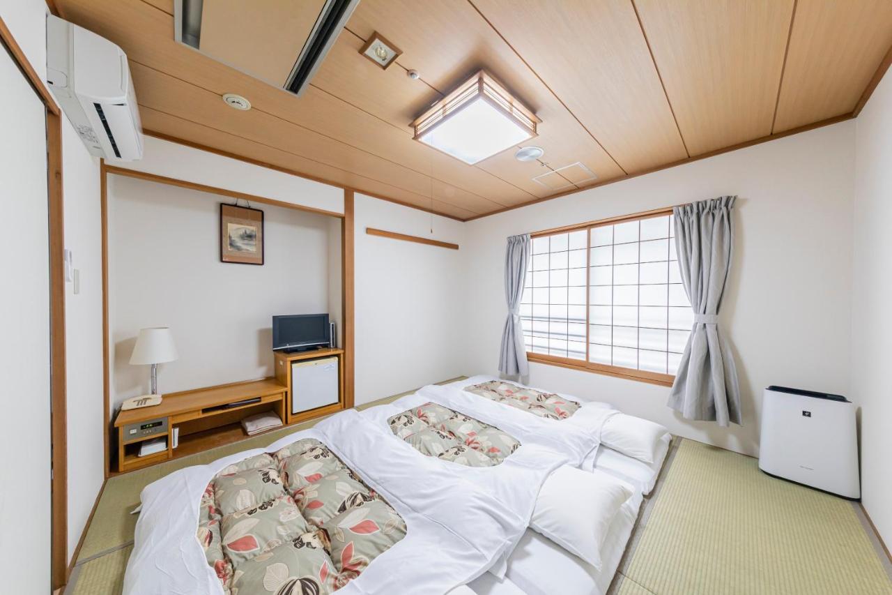 Sunny Stone Hotel Suita Exterior foto
