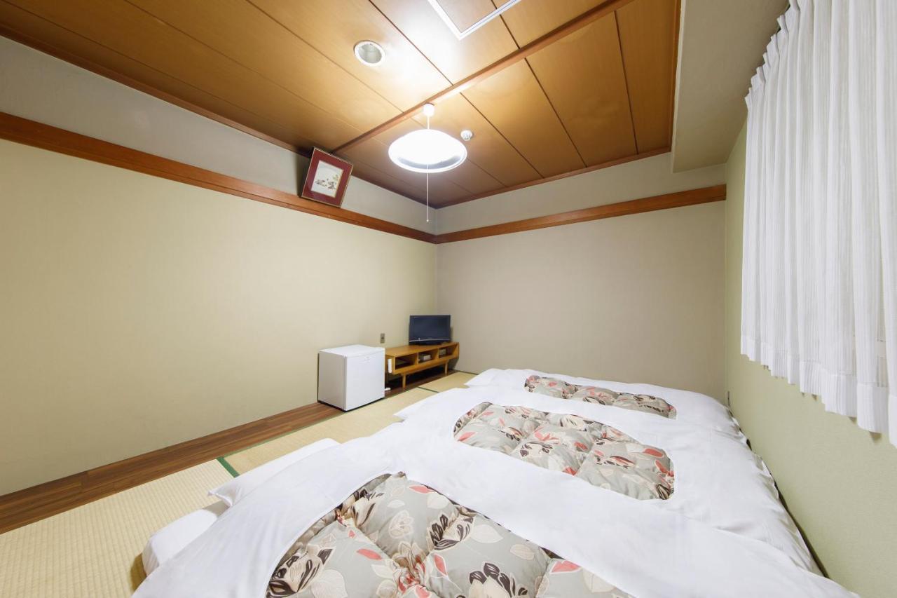 Sunny Stone Hotel Suita Exterior foto